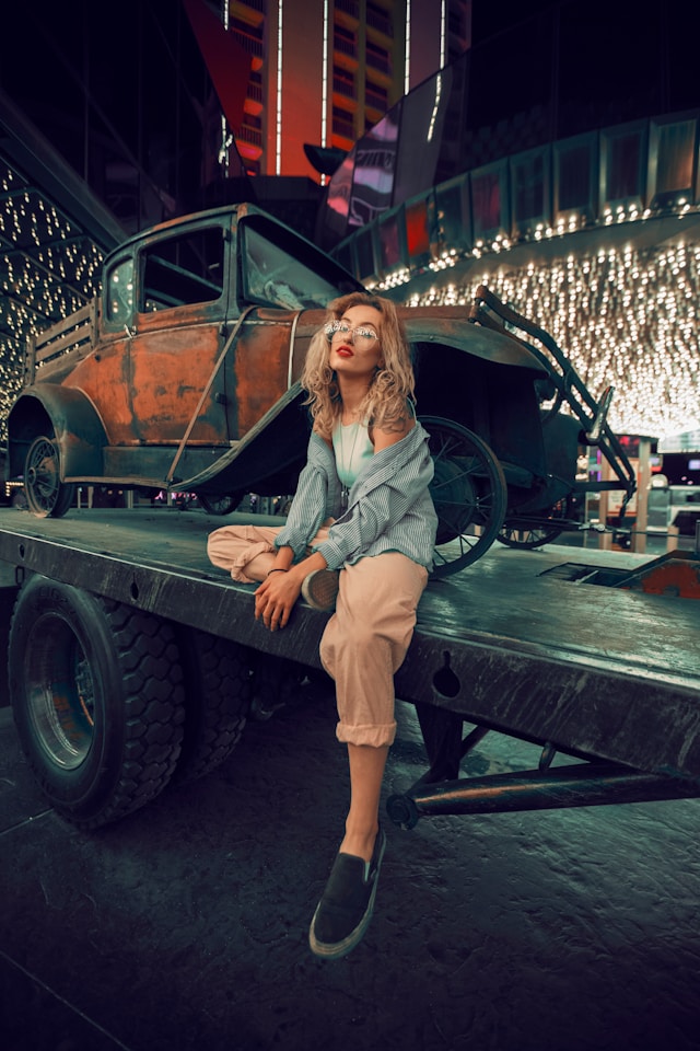 Nighttime Serenity: Woman’s solitude on a utility trailer